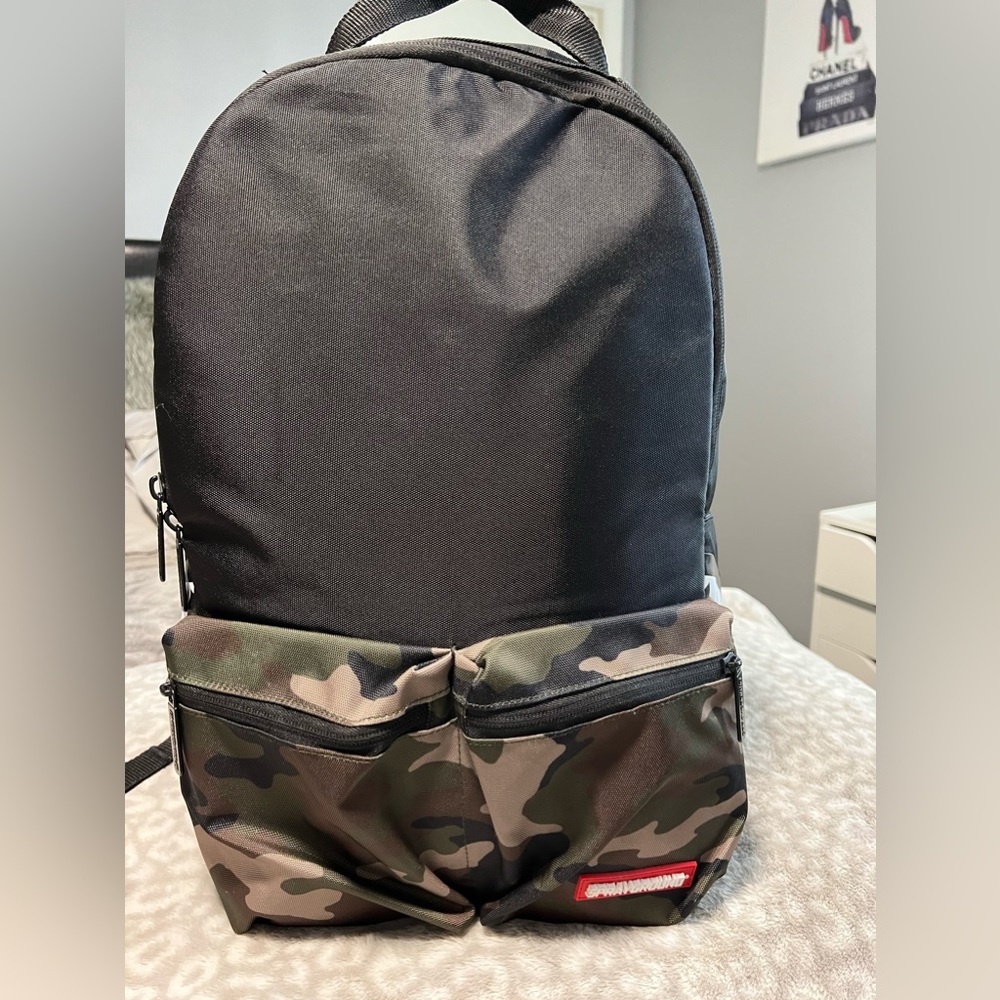 Spray ground backpack